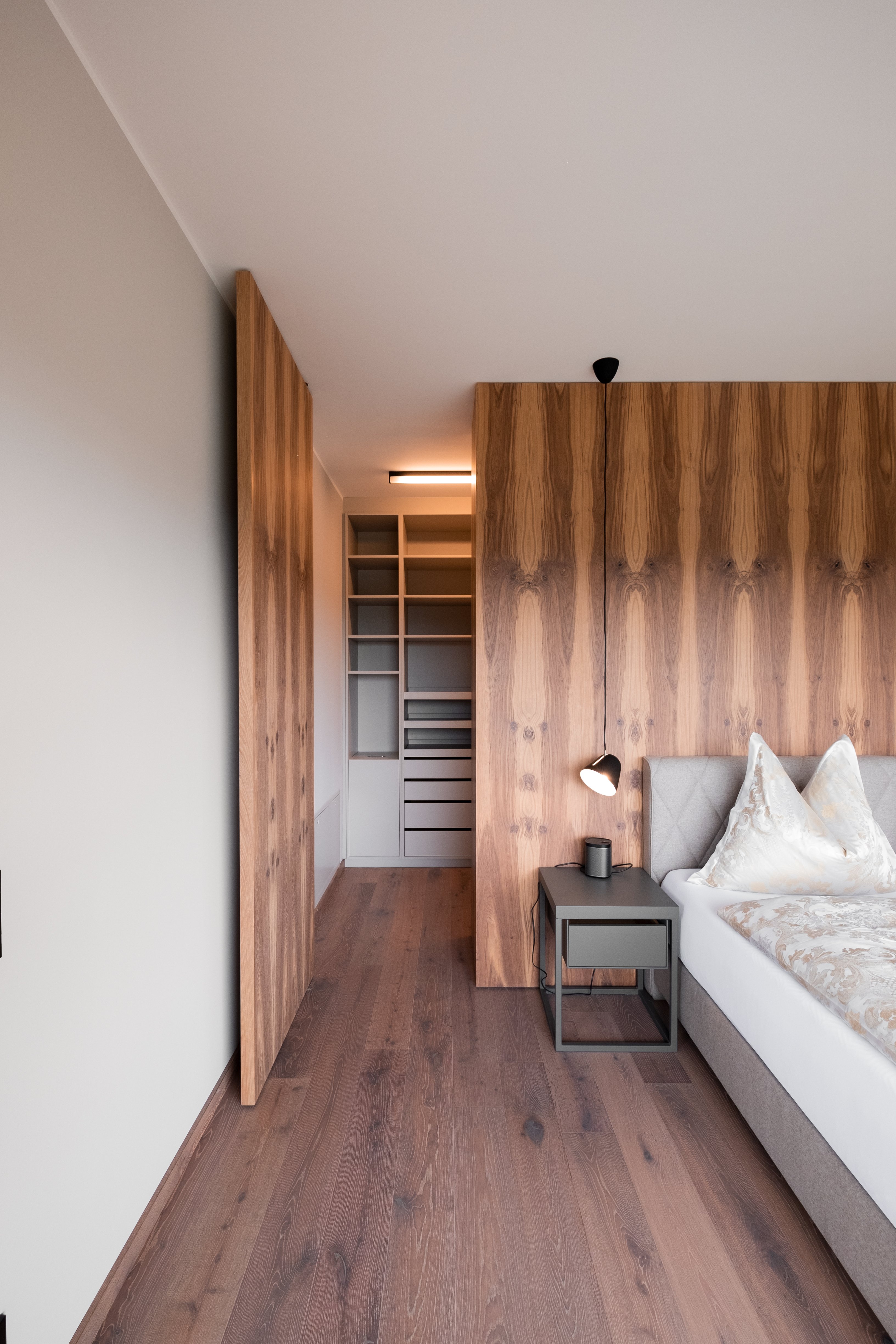 Hidden door with hidden pivot hinges by FritsJurgen - Manufacture by Breitenthaler. Photography by Elena Egger