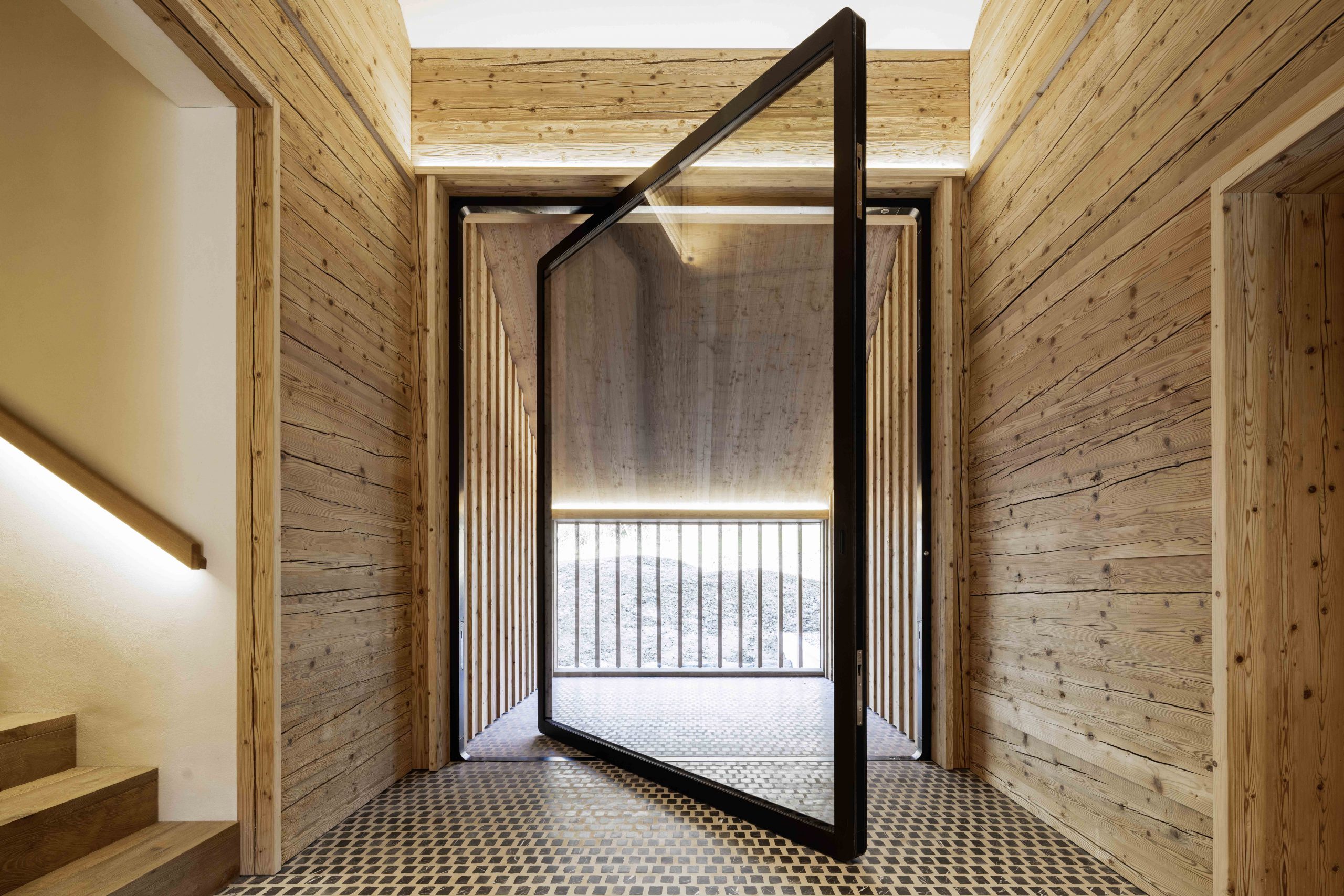 2674-balcony-pivot-door-designed-by-air-lux-scaled.jpg